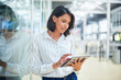© TasJam/peopleimages.com - Office, tablet and businesswoman with article for reading, local updates and breaking news on publication. Journalism, female person or journalist with digital for editing, research and online source