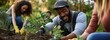 © CYBERUSS - A diverse group of people planting trees in a community garden, symbolizing collective efforts in reforestation and combating climate change.