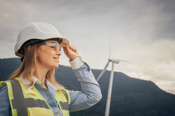 Poster - A Female Engineer at a Wind Farm focuses on innovative renewable energy solutions that benefit the environment and promote sustainability, emphasizing engineerings role in technology and teamwork