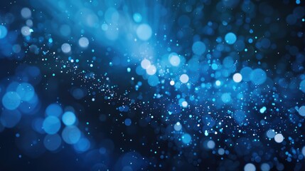 Abstract blue blurry unfocused sparkle glitter blue bokeh background wallpaper with copy space. Blue Christmas glitter design background.