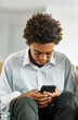 © Lumos sp - teenage technology smartphone phone boy texting young mobile phone communication internet student teenager black mobile man male portrait smart phone online child connection