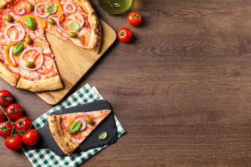 Wall Mural - Delicious vegetarian pizza served on wooden table, flat lay. Space for text