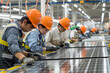 © Mikhail - Technicians assemble solar panels in a modern eco friendly manufacturing facility