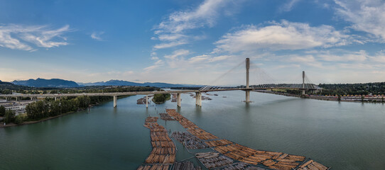 Wall Mural - Port Mann Bridge over Fraser River at sunset. Vancouver, BC, Canada