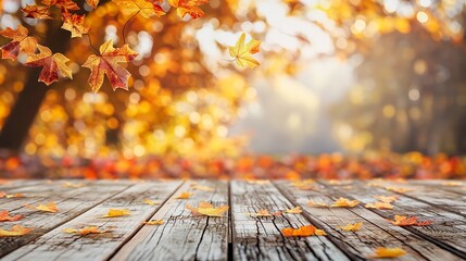 Poster - Rustic wooden table with blurred autumn background and golden yellow old leaves, autumn table background copy space outdoors