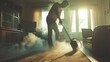 © mirifadapt - man vacuuming the carpet in his living room