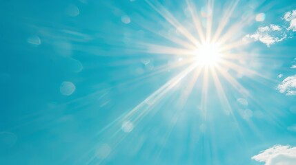 Poster - Bright sunbeam shining through a clear blue sky