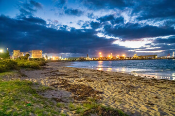 Sticker - Along the shoreline and beach of Geraldton at night, Australia