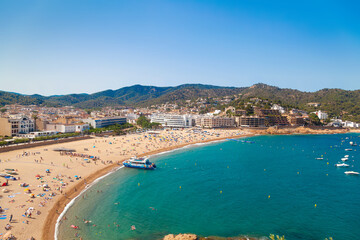 Poster - Sandy beach drenched in sun. Ideal for travel and tourism content.