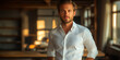 © NILSEN Studio - A poised individual in a business-casual outfit standing confidently in a sunlit loft, exuding professionalism and charm in a stylish setting.