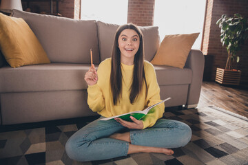 Sticker - Full length photo of nice teen lady sit floor do homework excited eureka dressed yellow garment spend pastime spacious house indoors room