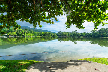 a public place leisure travel landscape lake views at Ang Kaew Chiang Mai University and Doi Suthep nature forest Mountain views spring cloudy sky background with white cloud.