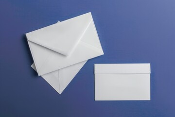 Poster - A collection of white envelopes lying on a bright blue surface