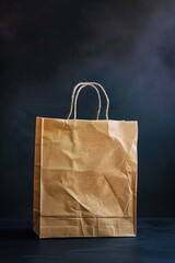 Aufkleber - A simple brown paper bag sits on a table, ready for use