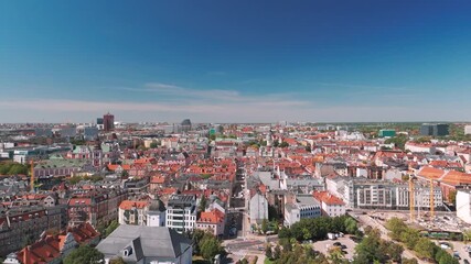 Wall Mural - Skyline cityscape of Poznań, Poland. Panoramic aerial view of Poznan Old Town market square (Rynek) and Town Hall (Ratusz) on a sunny summer day