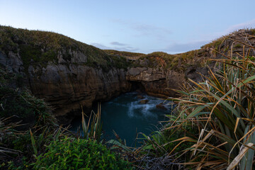 Wall Mural - Beautiful view of rock cliff in the ocean.