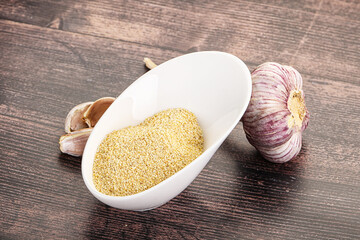 Wall Mural - Dry granulated garlic aroma seasoning