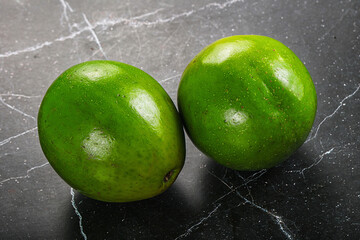 Two ripe green exotic avocado fruit