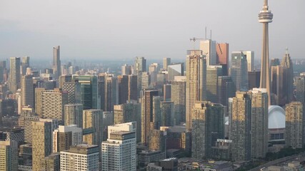 Canvas Print - Aerial view of Toronto skyline from helicopter on a beautiful summer sunset, Ontario - Canada