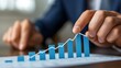 © areef - Businessman Analyzing Growth Chart.