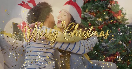 Sticker - Hugging and smiling, couple celebrating Christmas with confetti and Merry Christmas animation