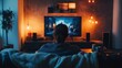 © Nathaphat - Cozy Evening at Home: Person Watching Drama Series on Sofa with Hot Drink and Blanket by Big-Screen TV in Dim Lighting