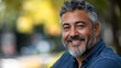 © Jess rodriguez - happy middle aged hispanic man looking at camera copy space