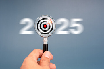 Poster - happy new year 2025 with business trends concept banner. target icon inside magnifying glass holding