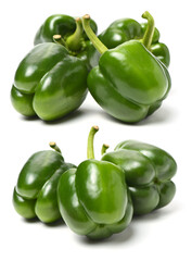 Wall Mural - fresh green bell pepper (capsicum) on a white background