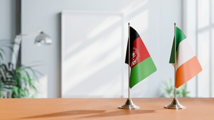 FLAGS OF AFGHANISTAN AND IRELAND ON TABLE