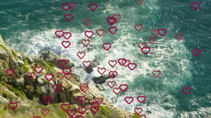 Poster - Red heart shapes animation over ocean waves hitting rocky shore