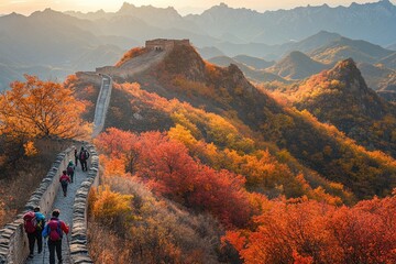 Great Wall of China with autumn foliage and tourists.