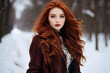 © Jati - A woman with long red hair is standing in the snow