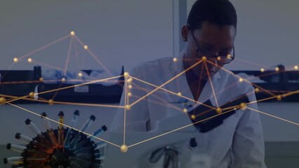  - Working in laboratory, scientist with network connections animation in background