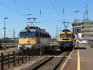 Two electric train engine at the platform