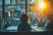 © Daria - A child sits at a desk in a sunny classroom, with a large window beside them, allowing sunlight to pour in, illuminating their study materials.