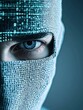 © Achirawee - A hacker's face partially obscured by a mask, with a digital code overlay creating an air of mystery. The composition includes significant copy space for text or visual elements.