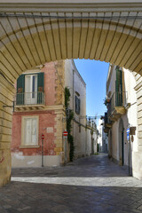 A narrow street in the historic center of Nardò, a tourist town in Puglia in Italy.