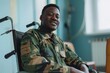 © Oleksandr - Military Man: Happy African American Soldier in Camouflage Uniform Sitting in Wheelchair