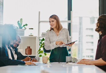 Canvas Print - Businesswoman, tablet and presentation discussion in office with team for budget report or company profit. Finance collaboration, employees or technology with feedback in boardroom for sales planning