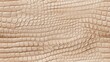 © Sunny_nsk - Seamless pattern with beige reptile skin scales texture.