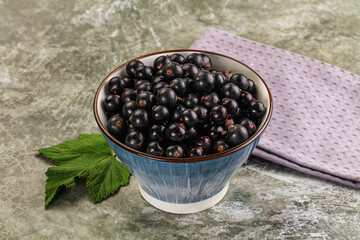 Wall Mural - Ripe black currant in the bowl