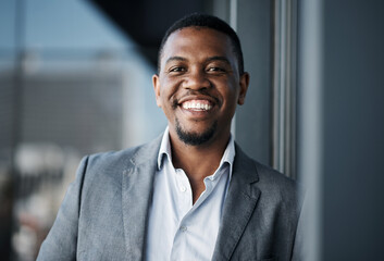 Canvas Print - Black man, portrait and happy in office for professional career, confidence and business opportunity. Human resources, face and manager with smile for recruitment, development and talent acquisition