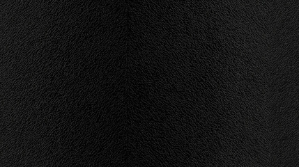 A texture background of slightly textured black color paper, showcasing a mid-level granularity that mimics the look of colored construction paper