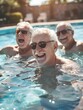 © Pascal - Senior friends enjoying a joyful moment in a swimming pool on a sunny day, laughter and happiness among elderly men having fun together