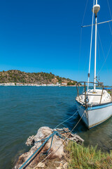 Canvas Print - Greece Peloponnese region Poros island and Galatas town seaside sailing boats on the blue sea