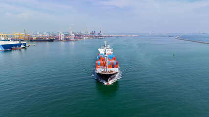 Wall Mural - logistic cargo container ship sailing in sea import export goods and distributing products to dealer and consumers across worldwide, by container ship Transport business service