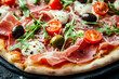 © Oksana_Latysheva - Pizza with cured ham, olives, mozzarella cheese, tomatoes and arugula commercial advertising photo