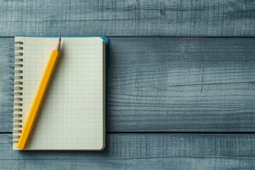 a pencil placed on open notebook