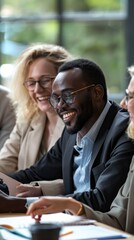 Poster - A group of smiling colleagues engages in a lively discussion, fostering creativity and camaraderie in a modern workspace